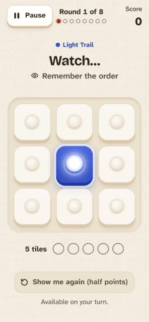 The Light Trail game: a 3 by 3 board of tiles with the middle tile lit up in blue.